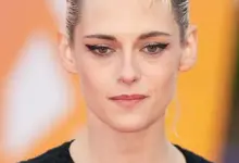 Kristen Stewart portrait showing her green eyes and short hairstyle